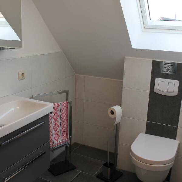 Bad mit ebenerdiger Dusche, Fußbodenheizung