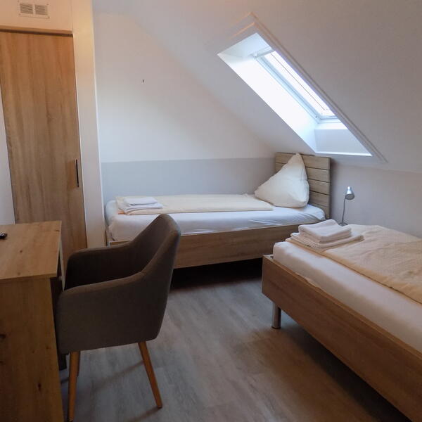 Schlafzimmer mit 2 Einzelbetten